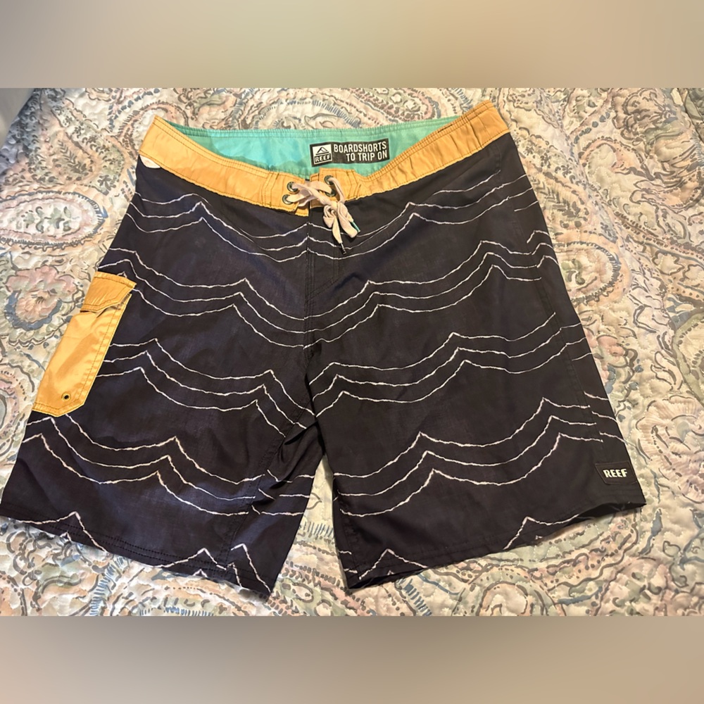 Reef Black and Tan Board Shorts with Drawstring Closure